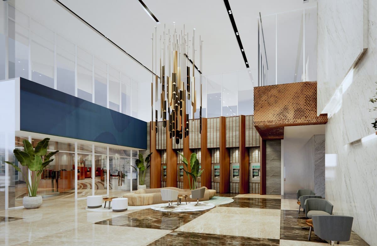 A spacious venue lobby with an art installation and seating